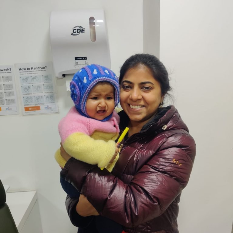 Pediatric Endocrinology Child Growth Delhi Pediatric endocrinologist gently examining happy baby during clinic visit