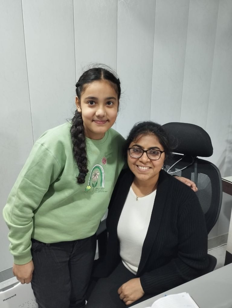 Pediatric endocrinologist consulting a child patient